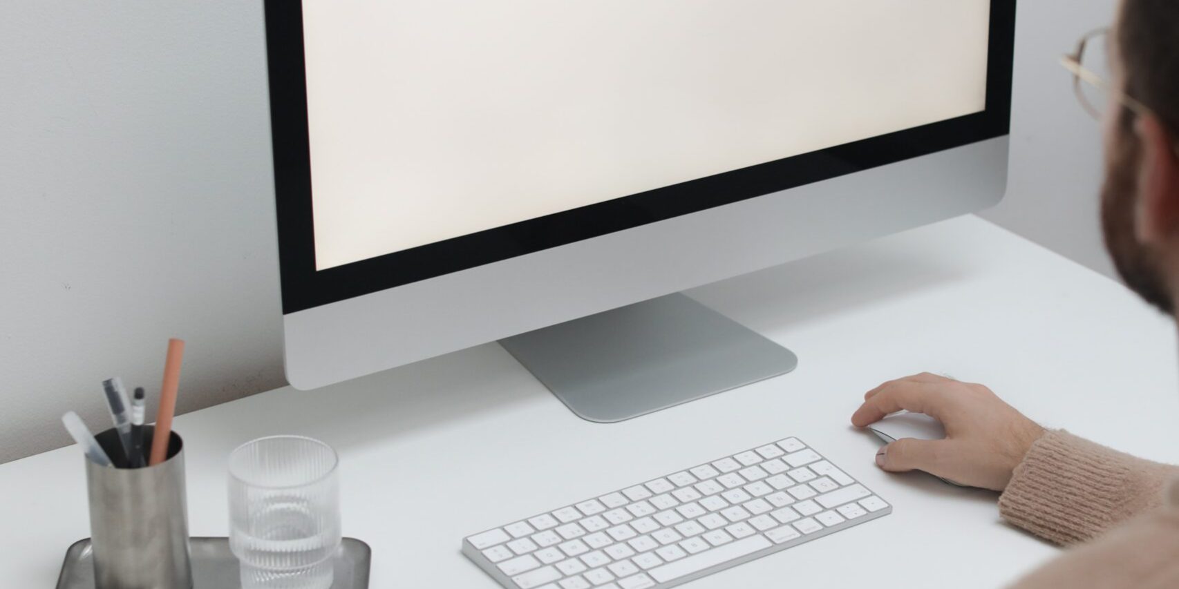 Do-You-Still-Believe-in-These-Common-Tech-Myths-scaled.jpg Free Crop man working on computer in workplace Stock Photo