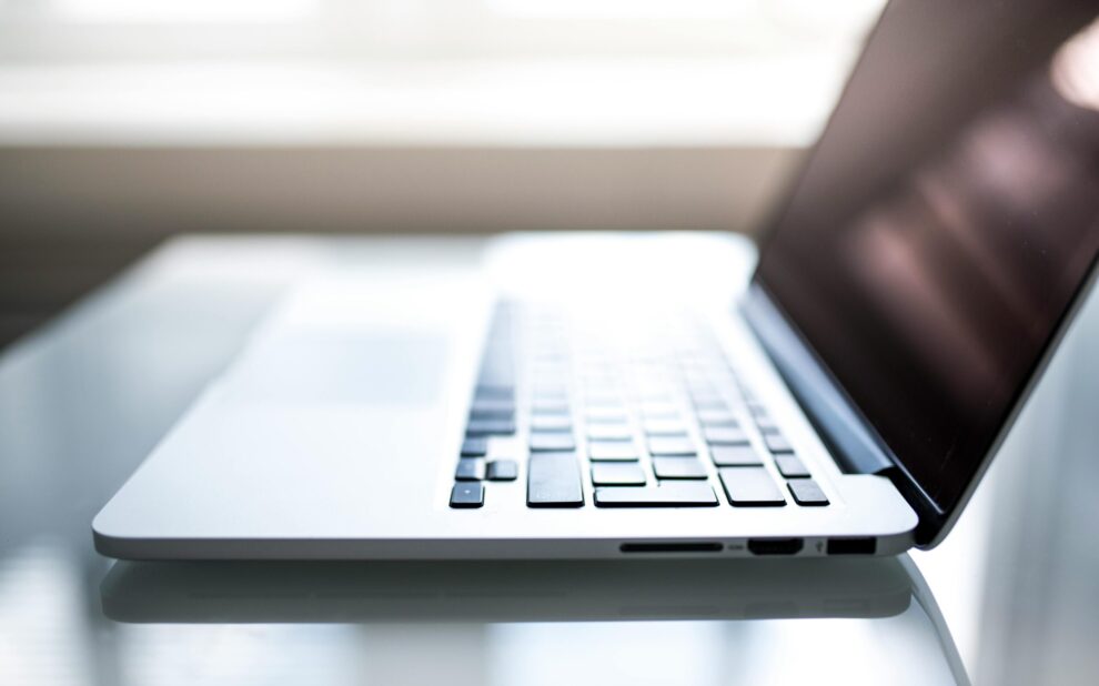 shallow-focus-photography-of-macbook